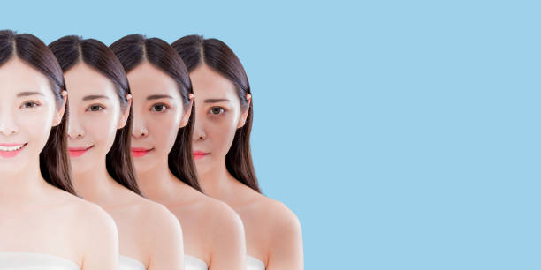 woman with skin whitening concept woman with skin whitening concept on the blue background skin whitening stock pictures, royalty-free photos & images