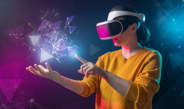Woman with VR virtual reality goggles stock photo