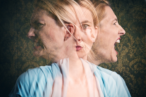 A multi-exposure of an emotional woman.