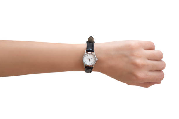 Woman's Hand Wearing Wrist Watch stock photo