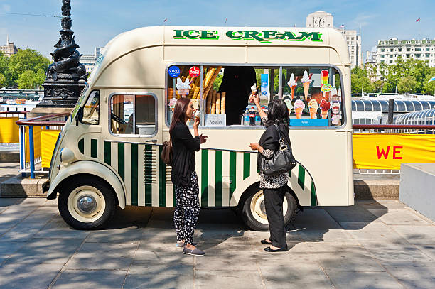women buying ice creams from van london - south bank london stockfoto's en -beelden