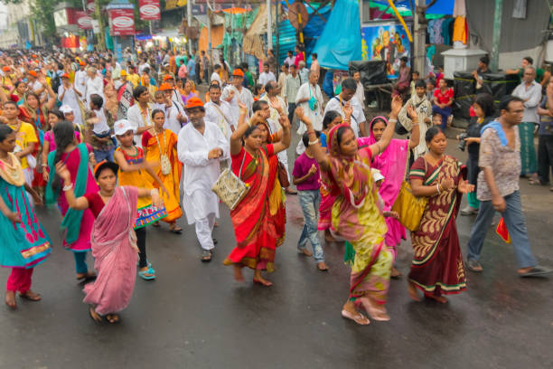 Women devotees dancing at Rath jatra at Kolkata stock photo