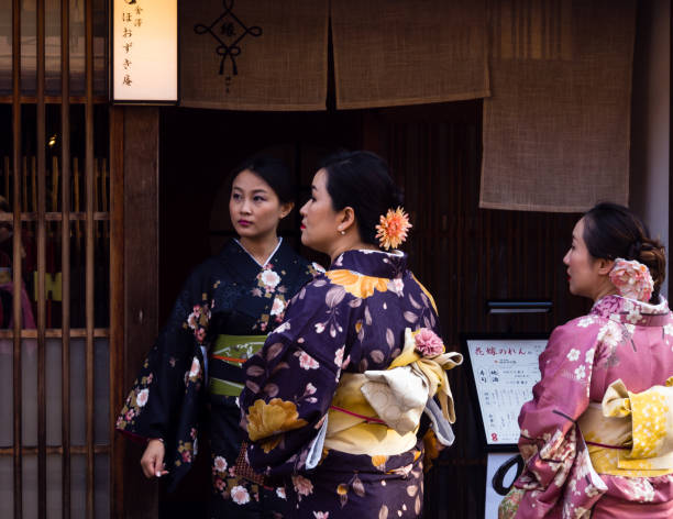 Women in kimono in historic district of Kanazawa, Japan stock photo