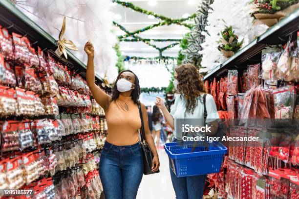 Women shopping for Christmas ornaments