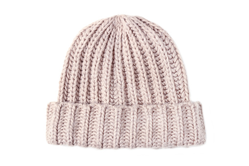 Women's winter knitted woolen hat isolated on white