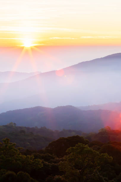Wonderful sunrise over mountain peak. stock photo