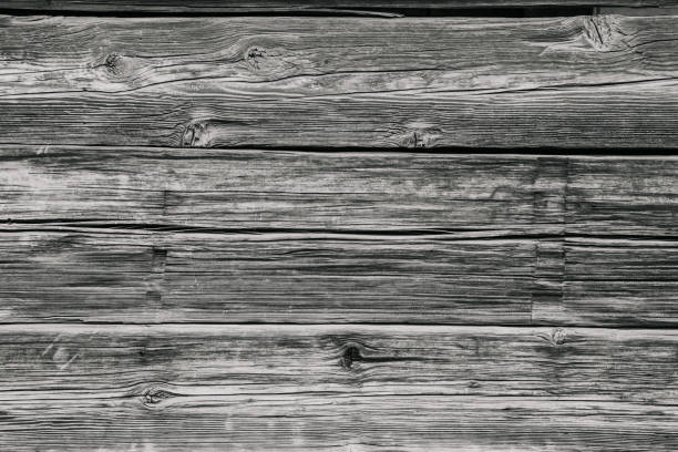 Wood (timber) aged wall, flat stacked planks background and texture in monochrome - creative stock image stock photo