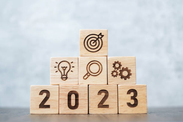 2023 wood block with business success, goal, strategy, target, mission, action, objective, teamwork, plan, idea and New Year start concept 2023 wood block with business success, goal, strategy, target, mission, action, objective, teamwork, plan, idea and New Year start concept asien startblock stock pictures, royalty-free photos & images