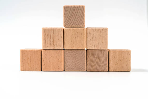 wood cube arrange in pyramid shape ,business concept wood cube arrange in pyramid shape ,business concept asien startblock stock pictures, royalty-free photos & images