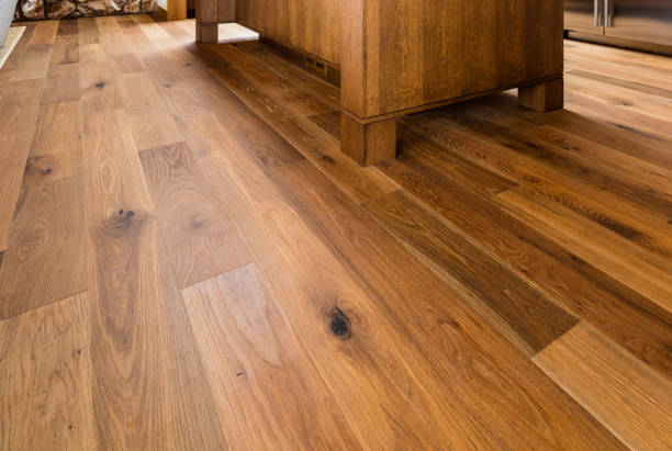Wood flooring in home Wood flooring in home close-up with table hardwood stock pictures, royalty-free photos & images
