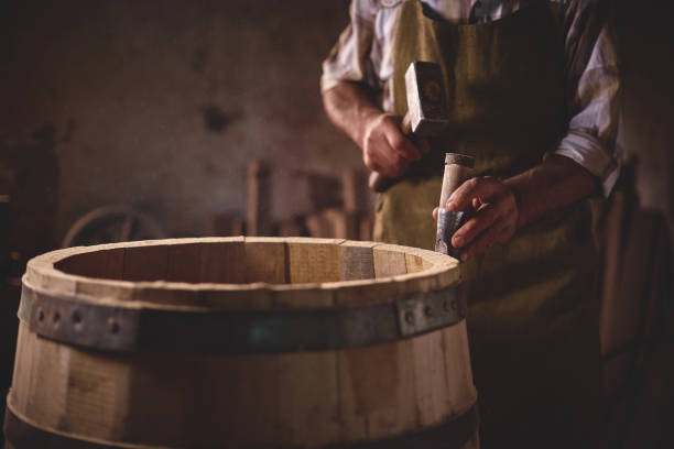 Wooden Barrels in a cooperage, barrel workshop  cooperage stock pictures, royalty-free photos & images