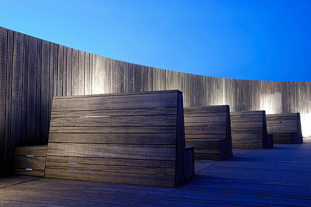 Wooden benches at night stock photo