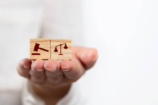 Wooden block cube shape with icon law legal justice stock photo