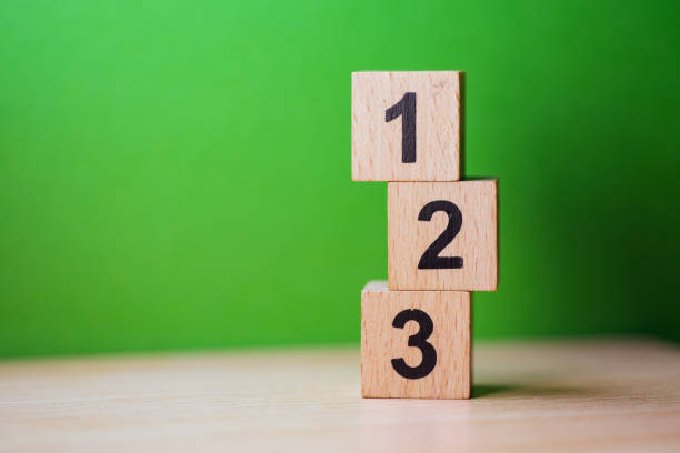 Wooden block number Wooden block number using as business and financial concept single object stock pictures, royalty-free photos & images
