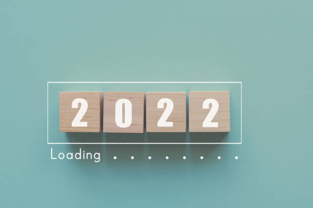 Wooden blocks in loading bar for 2022 Goal planning business concept stock photo