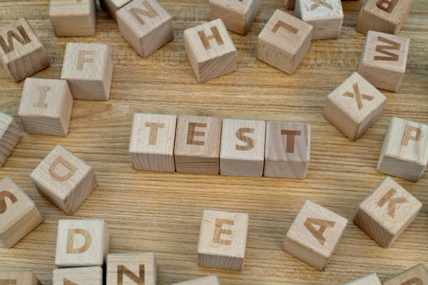 Wooden blocks with word test stock photo