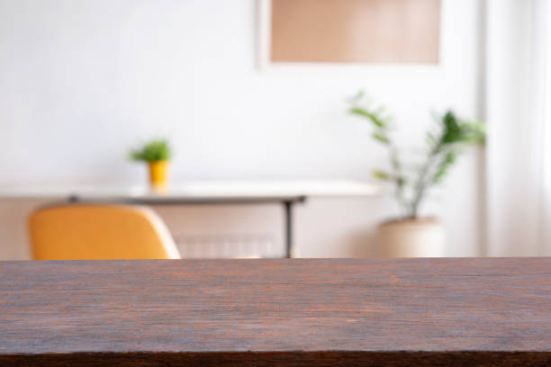Wooden board empty Table Top And Blur Interior over blur in coffee shop Background stock photo