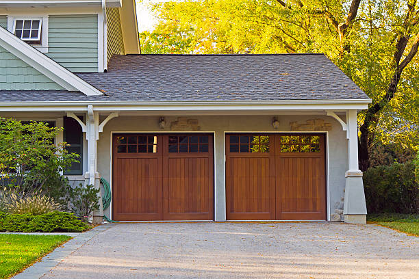 Wooden car garage Two wooden car garage residence garage stock pictures, royalty-free photos & images