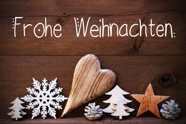 деревянные рождественские украшения, сердце, фрохе weihnachten означает с рождеством христовым - weihnachten стоковые фото и изображения