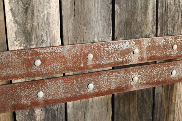 Wooden Fence with Iron Slats stock photo