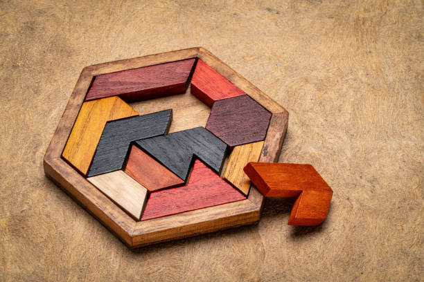 wooden hexagon tangram puzzle stock photo