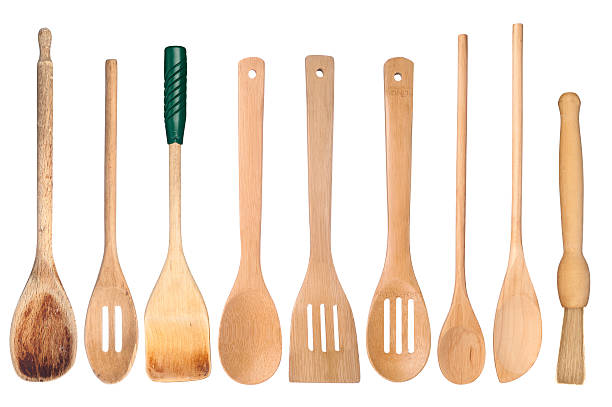 Wooden kitchen utensils stock photo