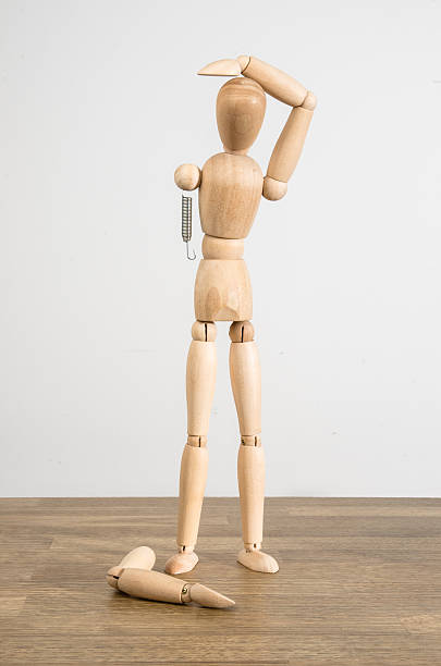 Wooden Mannequin Dummy Broken Wooden Mannequin Dummy on white background. broken doll 1 stock pictures, royalty-free photos & images