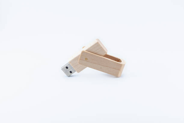 Wooden pen drive on white background stock photo