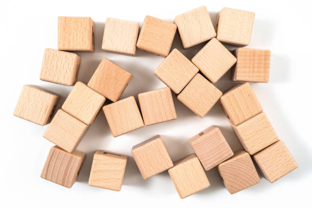 Wooden toy blocks isolated on white background. Clipping path included. Wooden toy blocks isolated on white background. Clipping path included. asien startblock stock pictures, royalty-free photos & images