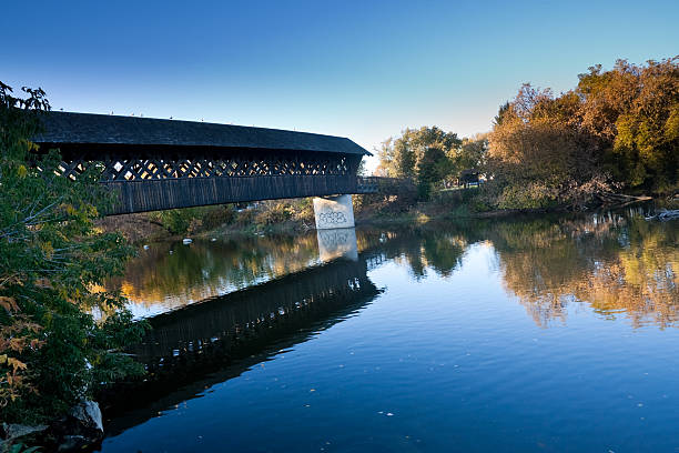 Wooden walking bridge on an autumn afternoon stock photo