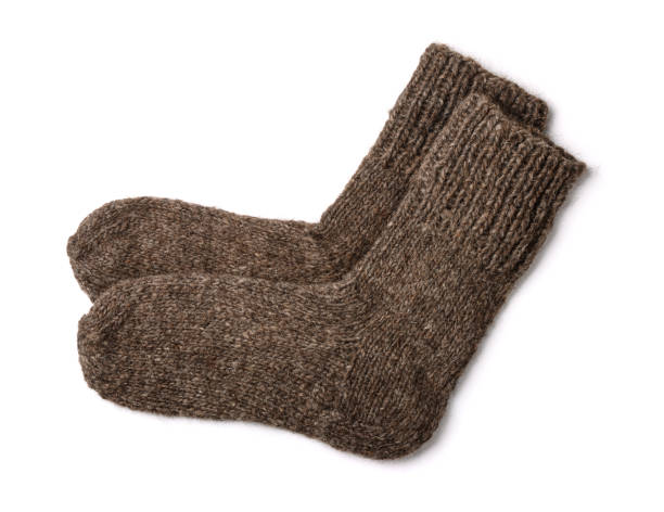 Woollen socks Homemade woollen socks isolated on white sock stock pictures, royalty-free photos & images