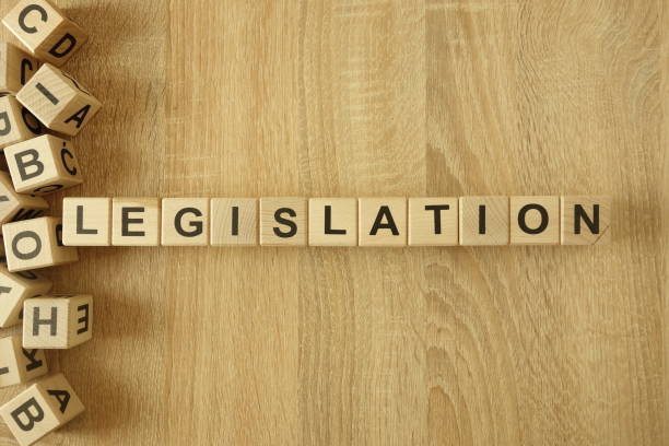 Word legislation from wooden blocks on desk Word legislation from wooden blocks on desk background bill legislation stock pictures, royalty-free photos & images