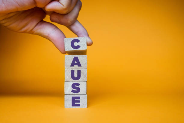 CAUSE word made with building blocks. stock photo