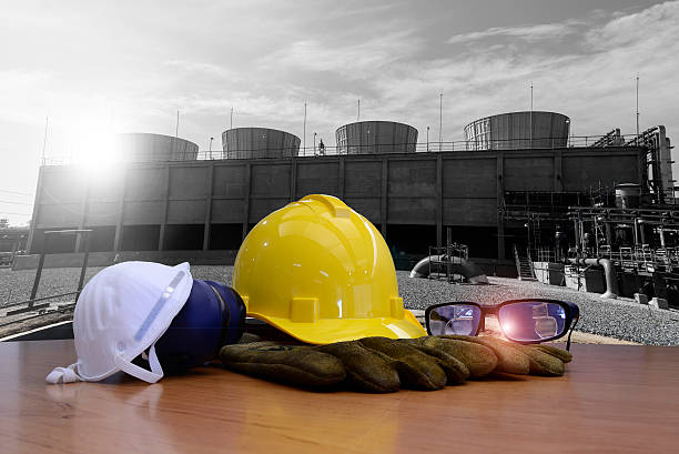 work outdoor wear safety equipment  at utility construction site . stock photo