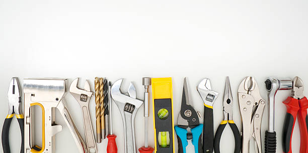 Work tools lined up on a white background stock photo