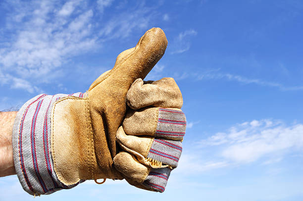 Worker Giving the Thumbs Up Sign stock photo