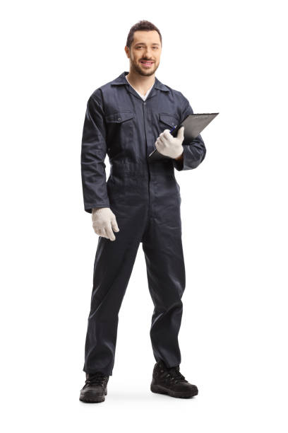 Worker standing and holding a clipboard Full length portrait of a worker standing and holding a clipboard isolated on white background mechanic stock pictures, royalty-free photos & images