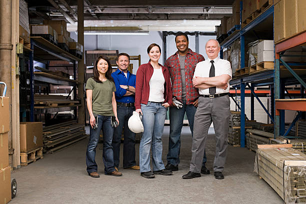 Workers in warehouse Workers in warehouse blue collar worker stock pictures, royalty-free photos & images