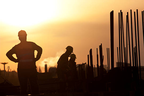 workers on construction, real human adult photo stock photo