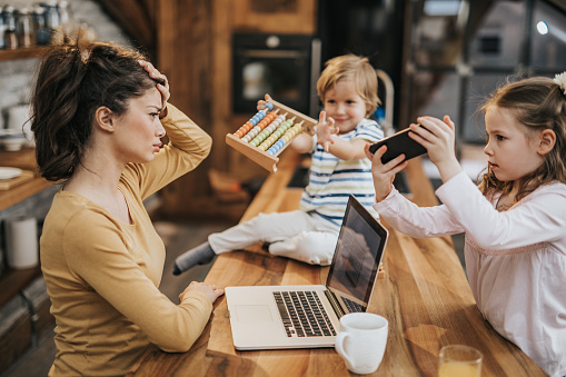 Working Single Mother Feeling Frustrated While Her Kids ...