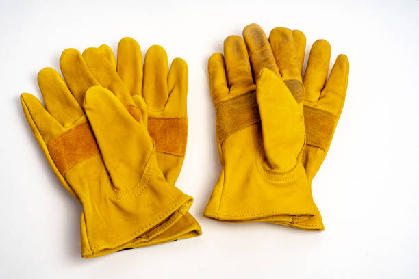 Workmans leather gloves for industrial ,fire protection type ,isolated on white background. stock photo
