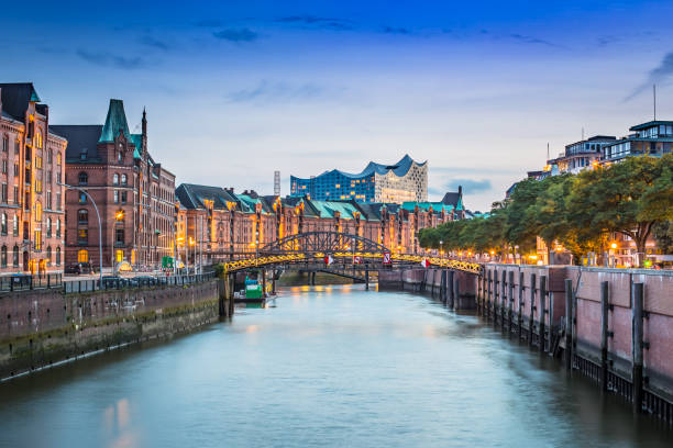 UNESCO World Heritage "Speicherstadt" in Hamburg - Germany „Speicherstadt“ in the evening elbe river stock pictures, royalty-free photos & images