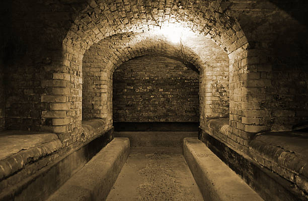 World War II British underground bunker Underground bunker from an old WWII fort near Felixstowe on the south coast of England. bomb shelter stock pictures, royalty-free photos & images
