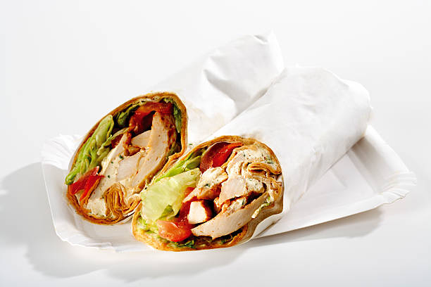 Wrap sandwich with white meat and salad stock photo
