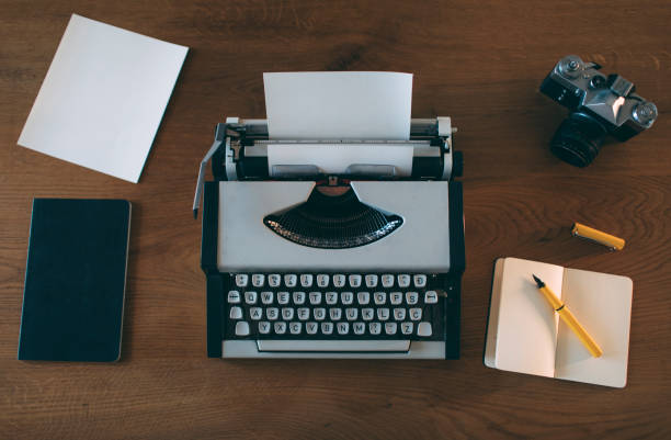 Writing desk with retro typewriter stock photo