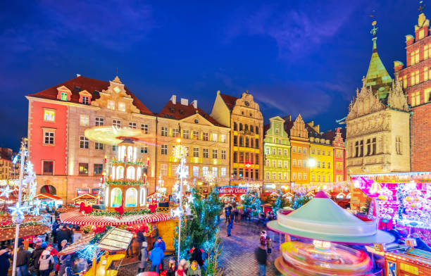 Wroclaw, Breselau in Poland - Christmas Market Wroclaw, Poland - December 2019: Breslau winter travel background with famous Christmas Market in Europe. wroclaw stock pictures, royalty-free photos & images
