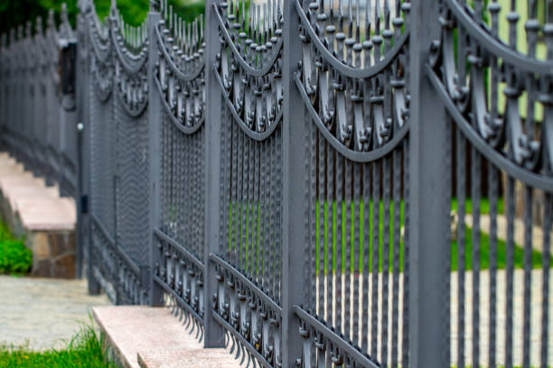 wrought-iron gates, ornamental forging, forged elements close-up stock photo