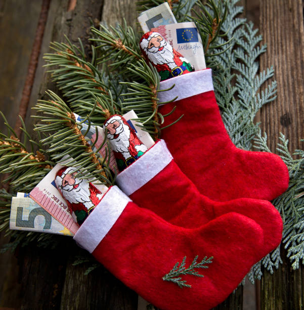 3 x weihnachtsgeld - nikolaus stiefel stock-fotos und bilder