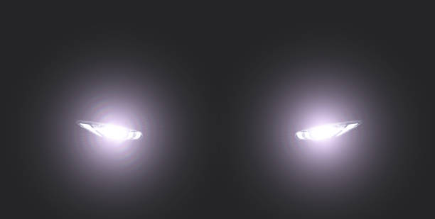 xenon car headlight in foggy dark chiaroscuro stock pictures, royalty-free photos & images