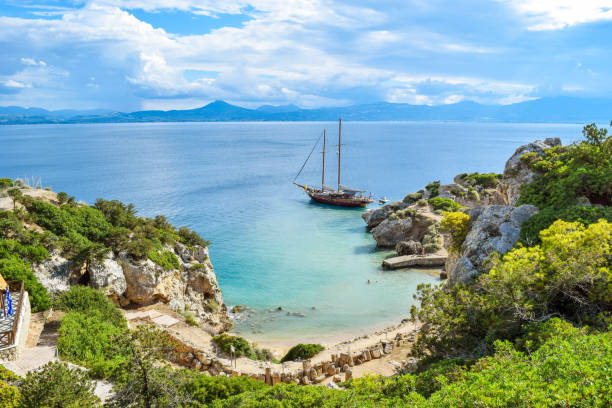 Yacht in small cove. The small cove of the Corinthian gulf near Heraion of Perachora, Greece. peloponnese stock pictures, royalty-free photos & images